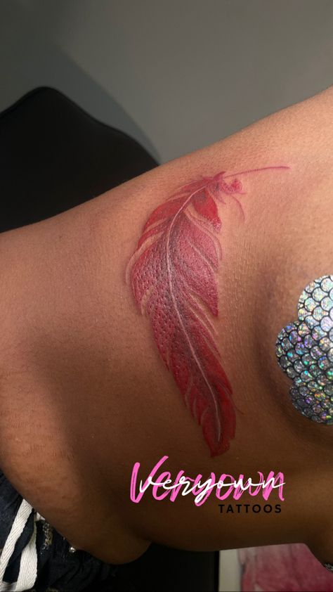 Red Ink Tattoo Cover Up, Red Tattoo Cover Up Ideas, Feather Tattoo Women, Creative Arm Tattoos, Feather Tattoos Underboob, Feather Name Tattoo, Red Tattoo On Brown Skin, Feather Underboob Tattoo, Underboob Name Tattoo