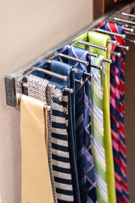 Our slide-out Tie Racks are a popular add-on to our closet designs. The sliding out function provides accessibility and visibility to where all of your ties can shine. Tie Storage Ideas, Sliding Pants Rack, Tie Organization Ideas, Tie Storage Ideas Diy, Organize Ties In Closet, Organizing Ties In Closet, Men Closet Ideas, Tie Storage Closet, Tie Racks For Closets