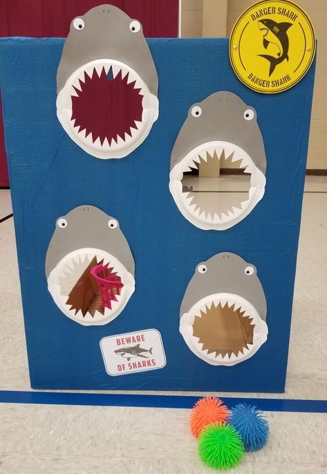 Shark Toss Game, Ocean Themed Carnival Games, Shark Kids Game, Ocean Theme Party Activities, Breaker Rock Beach Vbs Games, Shark Party Activities, Ocean Birthday Games, Baby Shark Birthday Party Games, Shark Birthday Games