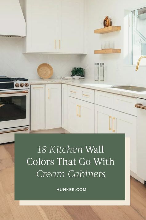 Want to make a splash in your kitchen? Painting your cabinets is a great place to start. Here are the best wall colors that go with cream cabinets. #hunkerhome #kitchen #kitchencolor #kitchenwallcolor Cream Colored Kitchen Cabinets Colour Schemes Farmhouse, Cabinets Painted Same Color As Wall, White Kitchen Cream Cabinets, Walls And Kitchen Cabinets Same Color, Cream Cabinets Wall Color, Oatmeal Colored Kitchen Cabinets, Kitchen Paint Colors Cream Cabinets, Cream Kitchen Units What Colour Walls, White Wall And Cabinet Color Combinations