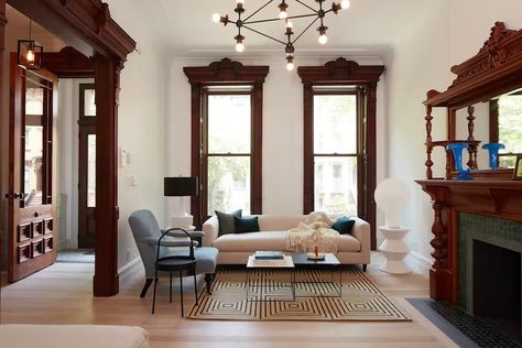 Bed-Stuy Brownstone posted by Opera Studio Architecture (10 Photos) - Dwell Original Wood Trim, Brownstone Interiors, New York Brownstone, Paint Cabinets White, Studio Architecture, Living Room Light, Light Hardwood Floors, Floor Sofa, Wood Details