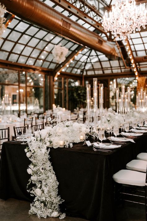 Elegant black and white reception decor with baby's breath, candlelight and black linens. Spotlight WiH Partners- Photography: Erika Geier Photography Guest Accommodations: Grand Galvez #WeddingsinHouston #RealWedding #DestinationWedding #BeachWedding #WeddingInspiration #Reception #ReceptionDecor #WeddingDetails Black And White Wedding Bride And Groom Table, Ceremony Backdrop Black And White, Black Bridal Party Color Schemes, Modern Reception Decor, Classic Wedding Theme Ideas, Moody Aesthetic Wedding, White Flower Alter, Neutral Reception Decor, Black And Wood Wedding Decor