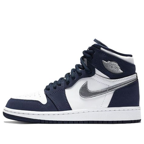 Released in 2001, the Air Jordan 1 Retro High CO.JP GS 'Midnight Navy' is making a comeback in 2020. This extremely limited colorway was originally only available in Japan and is now available to everyone. The sneaker's two-tone white and navy leather upper is accented with a metallic silver Swoosh and a matching jewel-finished Wings logo on the lateral collar flap. Embroidered Nike branding adorns the tongue, replacing the Jumpman icon of the original. Get your hands on this piece of history wh Retro Basketball Shoes, Blue Jordans, Jordan Shoes Retro, Womens Air Jordans, Jordan 1 High Og, Air Jordan 1 Retro High Og, Nike Brand, Air Jordan 1 Retro High, Air Jordan 1 High