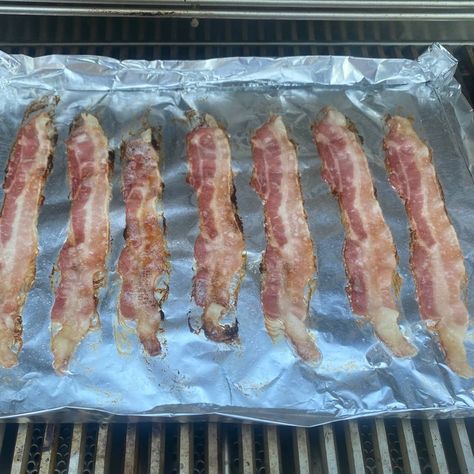 What's the best way to cook bacon on a grill? Aluminum foil makes the process easy and allows for quick clean up. Here's a guide to grilling bacon with aluminum foil. Apple Pork Loin, Grilled Brats, Bacon Grill, Apple Pork, Bacon In The Oven, Bacon On The Grill, How To Make Bacon, Bacon Appetizers, Beef Bacon