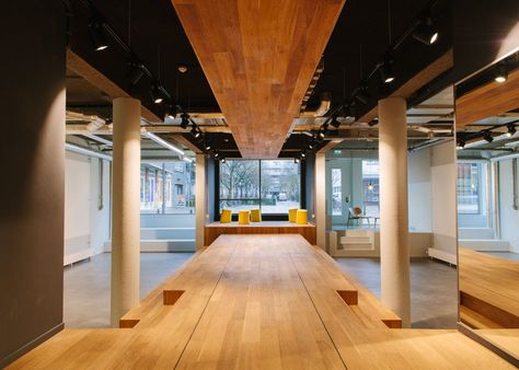 A wooden catwalk runs through the middle of this hotel conference room in the Netherlands to allow the speaker to be "free to move and walk around" Open Conference Room, Presentation Room, Conference Table Chairs, Hotel Conference Rooms, Student Hotels, Catwalk Design, Conference Room Design, Corporate Interior Design, Conference Room Chairs