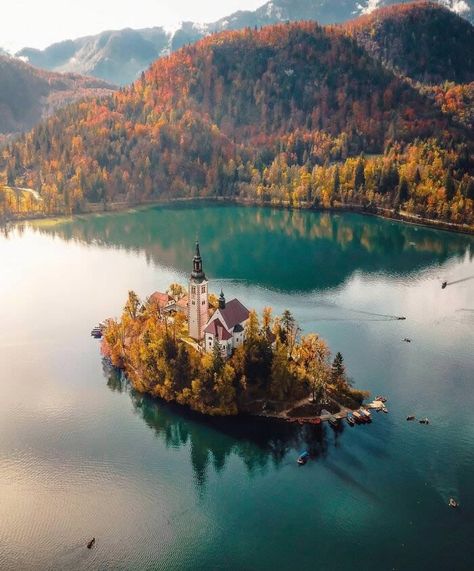 Capturing Beauty Beyond Borders: 30 Spectacular Travel Photographs By Davide Anzimanni Lake Bled Slovenia, Bled Slovenia, Julian Alps, Lake Bled, Destination Voyage, Travel And Tourism, Travel Photographer, Travel Insurance, Tourist Destinations