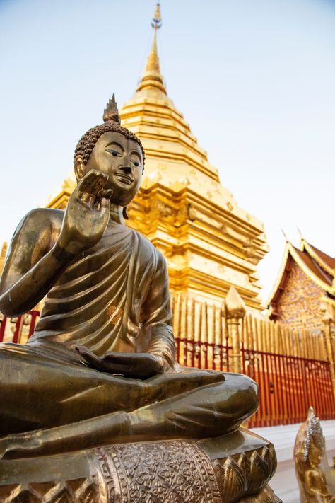 Picture features a statue of buddha outside of an impressive golden temple Thailand Tourist, Thailand Flag, Temple Thailand, Thailand Adventure, Visit Thailand, Chiang Rai, Most Beautiful Images, Overseas Travel, Northern Thailand