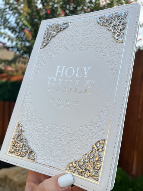 Celebrate the sacraments, rites and ceremonies of the Church with the White Faux Leather Large Print Thinline KJV Bible with Thumb Index! Whether you are celebrating a baptism, confirmation, church membership, first communion, christening, or wedding, the pure white KJV Bible will mark your rite of passage in a meaningful and memorable way.  this style is also available with floral tabs, please message me for pricing and ordering   (I started making these bibles to help pay for my husband's trem Kjv Journaling Bible, Bibles For Women, Pretty Bible, White Bible, Aesthetic Bible, Wedding Bible, Bible King James Version, Cute Bibles, Custom Bible