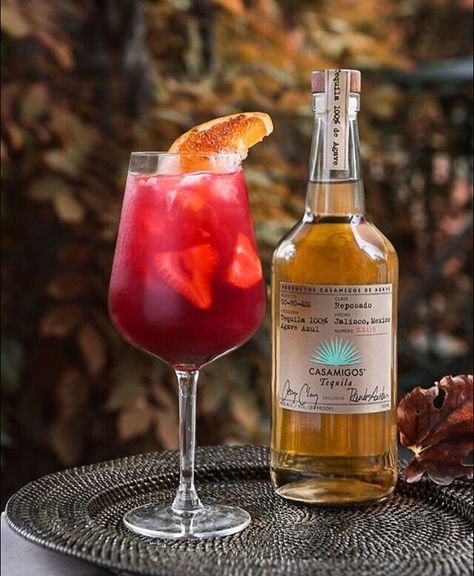 CASA SANGRITA  1.5 oz. #Casamigos Reposado 1.5 oz. Red wine (Malbec or full cabernet) 1 oz. Cane Sugar .5 oz. Fresh lemon juice .5 oz. Orange juice 2 Full strawberries 2 Orange wedges  Combine all ingredients into tin shaker. Muddle fruit. Dry shake (no ice). Fine strain into large wine glass. Add fresh ice. Garnish with 4-5 thinly sliced strawberries and large thinly slice half orange wedge with cinnamon over top. #CasamigosCocktails Casamigos Reposado, Tequila Sangria, Tequila Drinks Recipes, Girly Drinks, Sliced Strawberries, Popular Cocktails, Grapefruit Soda, Orange Wedges, Tequila Drinks