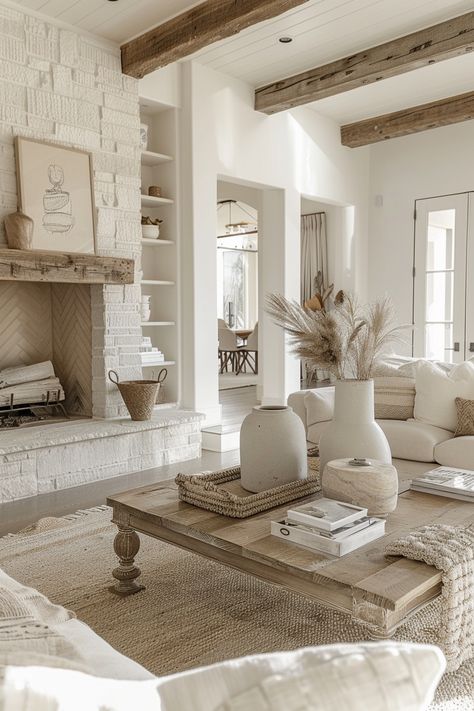 30 Neutral Coastal Decor Ideas That Scream Vacation Mode Neutral Beach House Interior Design, Coastal Hotel Design, Beach Coastal Interior Design, Coastal Mediterranean Decor, Cozy Lounge Room, Neutral Decorating Ideas, Neutral Fireplace, California Coastal Living Room, Coastal Fireplace Ideas