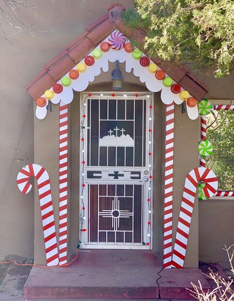 Gingerbread House Front Door, Ginger Christmas Decoration, Outdoor Christmas Gingerbread Decor, Christmas Gingerbread House Decorations Outdoor, Gingerbread Entryway, Wrapping Paper Front Door Christmas, Gingerbread House Porch Decor, Gingerbread Front Door, Gingerbread Front Porch