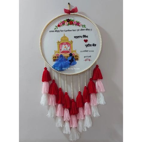 Sikh Wedding Hoop with Tassels Dm for Customization HOOP ART BY ROZEN [Wedding Hoop, Sikh Wedding Hoop, Wedding Gifts, Handmade, Embroidery Hoop Art] #embroideryhoopart #hoopart #handcrafted #handmade #weddinghoop #sikhweddinghoop #embroideryhoopwithtassels #dmfororders #customisedgifts Wedding Hoop Embroidery, Marriage Embroidery, Wedding Gifts Handmade, Sikh Couple, Wedding Embroidery Hoop, Embroidered Wall Art, Wedding Hoop, Wedding Embroidery, Customised Gifts