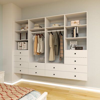 This white modular closet system with drawers is made of solid manufactured wood which comes with high-quality eco-friendly materials and white finishes. Our wall-mounted designed closet organizer and storage system, which is perfect for walk-in closets and any reach-in areas, allows you to maximize storage space and leverage vertical space in your home. With 8 fixed closet shelves, 12 full extension drawers and 2 sturdy hanging rads, our wood closet organizer system kit unit provides plenty of Wall Mounted Wardrobe Design, Dutton House, Closet System With Drawers, Modular Closet System, Compact Laundry Room, Stairs Bedroom, Elegant Laundry Room, Wood Closet Organizers, Modular Closet