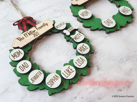 Design personalized family Christmas ornaments and wood garlands to celebrate the season together. These unique decorations make wonderful gifts and cherished keepsakes. Wood Garland, Garland Wreath, Personalized Christmas Ornaments Family, Laser Cut Wood Crafts, Wreath Ornament, Laser Engraved Ideas, Family Ornaments, Family Christmas Ornaments, Wooden Ornament