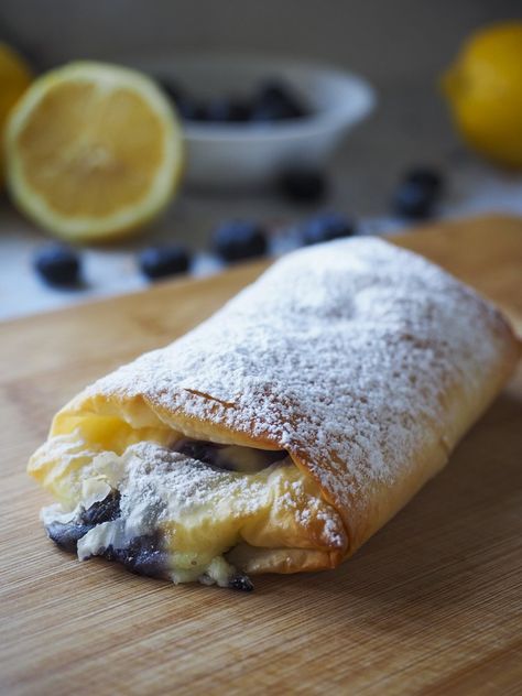 Lemon and Blueberry Bougatsa Parcels Fillo Pastry Recipe Filo Pastry — Antoniou Fillo Pastry Bougatsa Recipe, Cheesecake Chimichangas, Filo Pastry Recipes, Phyllo Dough Recipes, Filo Pastry, Pastry Recipe, Blueberry Sauce, Blueberry Desserts, Greek Desserts