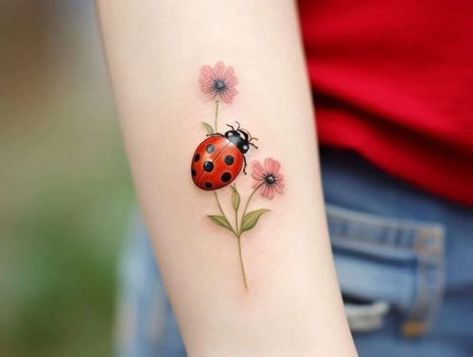 Embrace Nature's Elegance: 15 Chic Small Floral Tattoo Designs for Every Style in 2024 Dainty Ladybug Tattoo, Small Floral Tattoo, Tattoo Ladybug, Ladybird Tattoo, Ladybug Tattoos, Memorial Tattoo Quotes, Ladybug Tattoo, Lantern Tattoo, Pride Tattoo