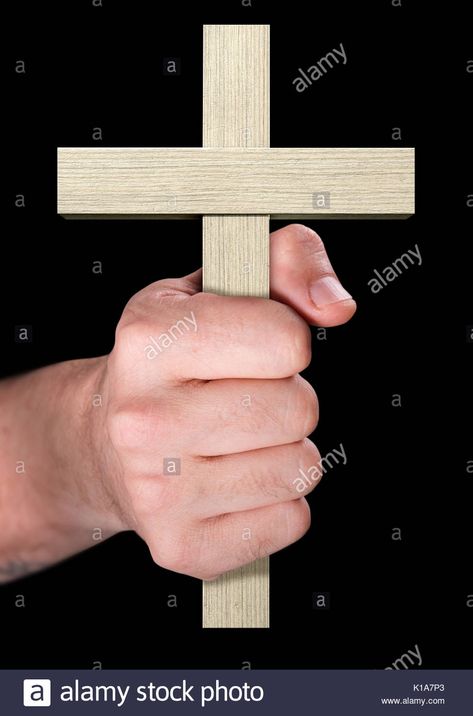 Download this stock image: A male hand holding a wooden cross on an isolated black background - K1A7P3 from Alamy's library of millions of high resolution stock photos, illustrations and vectors. Holding Cross Reference, Irl References, Cross Drawing, Hand Pictures, Male Hands, Wooden Cross, Christian Cross, Figure Drawing Reference, Hand Holding