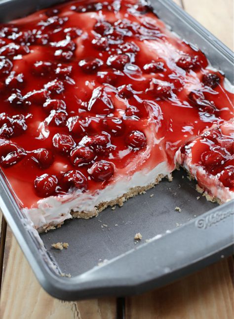 No-Bake Cherry Cheesecake. This No-Bake Cherry Cheesecake is a winner of a dessert! It’s so easy to make and it’s absolutely delightful! Three layers of total bliss! #cheesecake #nobakecheesecake #dessertrecipes #easydessert Cherry Cheesecake Surprise Layered Dessert, Cheesecake Layered Dessert, No Bake Cherry Cheesecake Bars, Unbaked Cherry Cheesecake, Best Ever No Bake Cheesecake, Easiest No Bake Cherry Cheesecake, Cheesecake Squares No Bake, Old Fashioned Cherry Cheesecake, No Bake Cherry Cheesecake With Cool Whip 9x13