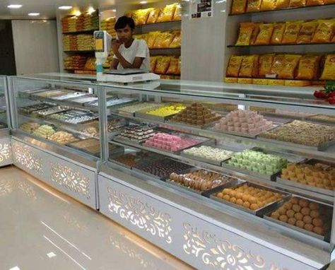 Indian Sweet Shop Design, Mithai Shop Interior Design, Indian Bakery Shop Interior, Sweet Shop Interior Design Indian, Cupboard Bed, Interior Showroom, Bakery Shop Interior, Interior Design Indian, Shop Counter Design