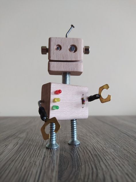 Robot made from wood scraps and recycled materials Diy Robot, Wood Scraps, Ornaments Diy, Paper Holder, Toilet Paper Holder, Toilet Paper, Recycled Materials, Recycling, Wood