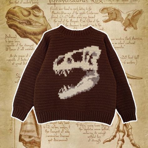 Dark brown crochet sweater with a beige and tan T. rex skull in the middle Graphic Sweater Crochet, Dinosaur Sweater Crochet Pattern, Crochet Sweater Graphic, Made In The Moment Crochet, Knit Dinosaur Sweater, Cool Crochet Sweater Patterns, Dinosaur Crochet Sweater, Grid Crochet Patterns Sweater, Cool Knitted Sweater