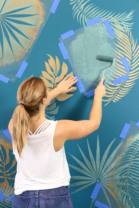 Bring the tropics into your space with these fun leaf stencils by Home Talk. Stencilling is cheaper (and more creative) than pricey wallpapers - so it's the perfect project if you're looking to update your home on a budget. | Painted Wall DIY | Home Decor Inspiration | Interior Design | Wonder Forest Rainbow Painted Walls, Tropical Stencil, Tropical Wall Mural, Wall Stencils Diy, Tropical Trend, Wall Murals Diy, Mural Stencil, Popular Interior Design, Stencil Projects