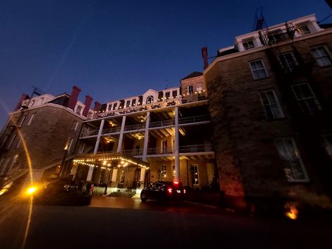 It's a big hotel that is famous for a doctor staying there and telling people he can cure cancer. Night photograph of the very large hotel Cresent Hotel, Famous Haunted Houses, Paranormal Aesthetic, Crescent Hotel, Arkansas Travel, Unexplained Phenomena, Haunted Hotel, Eureka Springs, Ghost Adventures