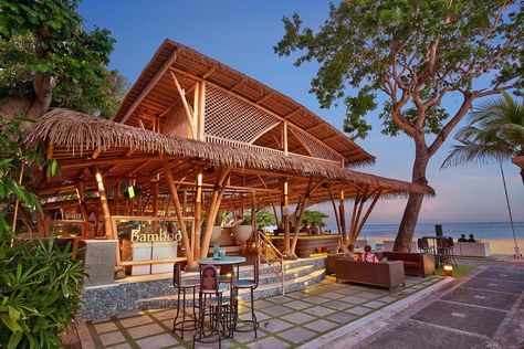 Bamboo Bar & Lounge perched on the Mertasari beach, is an idyllic place in Sanur. White sandy beach extends an ocean view which exposed as an ideal space for in Beach Restaurant Design, Bamboo Restaurant, Splash Zone, Bamboo House Design, Glamping Resorts, Bamboo Bar, Bamboo Architecture, Rustic Restaurant, Classic Villa