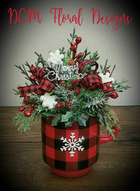 Coffee Mug Christmas Floral Arrangement, Christmas Arrangements In A Mug, Coffee Cup Flower Arrangements Christmas, Christmas Mug Centerpieces, Christmas Mug Arrangement, Evergreen Centerpieces, Evergreen Arrangements, Sand Creations, Xmas Centerpieces