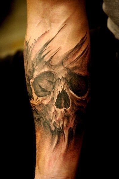 This forearm tattoo highlights a ghastly yet strikingly beautiful face of a skull. It seems to have a life of its own with long black veins above and below the intricate drawing this delicately inked picture is made up of. #tattoofriday #tattoos #tattooart #tattoodesign #tattooidea Skull Sleeve Tattoos, Skull Sleeve, Biker Tattoos, Sugar Skull Tattoos, Geniale Tattoos, Skull Tattoo Design, Celtic Tattoos, Diy Tattoo, Badass Tattoos