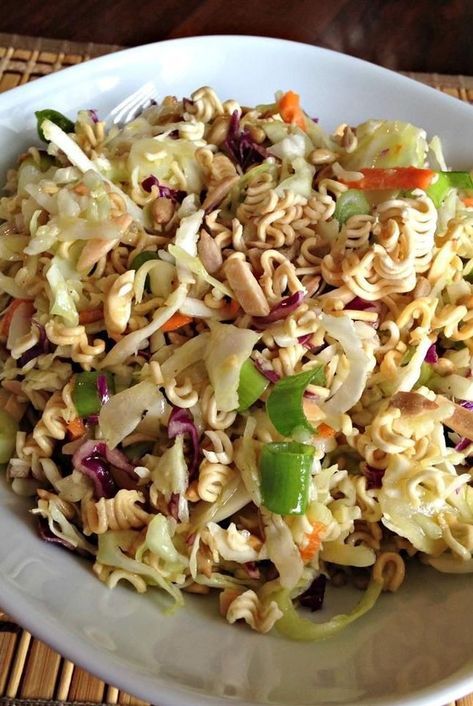 Looking for salad recipes? Try making this ramen salad. Use roman noodles, cabbage, almonds, and sunflower seeds to make this quick and easy ramen salad for a side dish, side salad, lunch, or dinner. #saladideas #saladrecipes #salads #vegetables #sidedishrecipes #sides #dinnersidedish #sidedishes #sidedishideas Ramen Cabbage Salad, Crunchy Noodle Salad, Best Ramen Noodles, Asian Inspired Salad, Ramen Salad, Ramen Noodle Salad, Ramen Dishes, Top Ramen, Noodle Salad Recipes