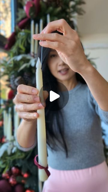 Chelsea on Instagram: "A tutorial on how I hang the candles on the tree. I tied a fishing line on the "flame" part of the candle, then hang it like an ornament on the tree branch. My tips for decorating a tree like this is to bundle 5-7 candles together and only use the candles as lights on the tree. It will give the candles all the spot lights when lit. #decoratewithme #christmasdecor #christmasideas #christmastree #christmasdiy #candlechristmastree" Floating Candles Christmas Tree, Wreaths Hanging From Branch, Candle Light Christmas Tree, Hanging Taper Candles, Taper Candles Christmas Tree, Christmas Tree In The Middle Of A Room, Ceiling Ladder Decor, Window Candles Ideas, Candles For Christmas Tree