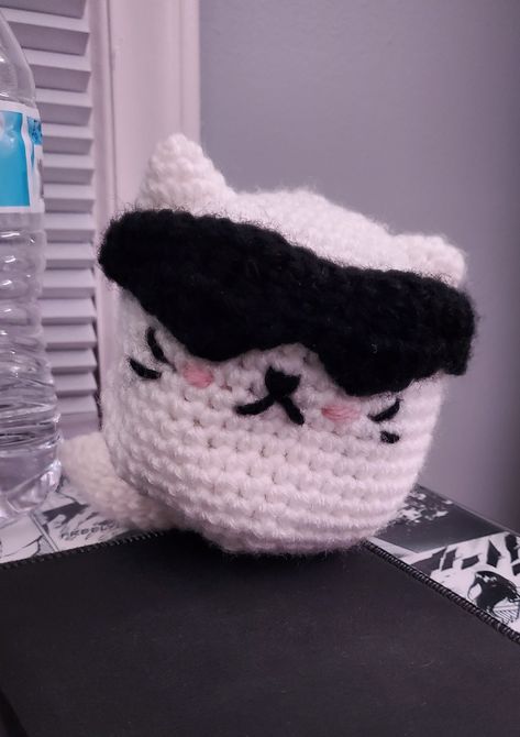 I used a pattern by fishi.is.afruitcup on tiktok to make this and I free handed the mask Crochet Gojo, Gojo Cat, The Mask, A Pattern, Mask, Crochet, Pattern, Pins, Quick Saves