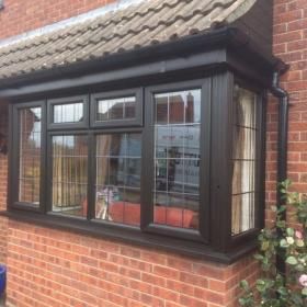 Black uPVC Windows with Square Lead Modern Bay Window Ideas, Bay Window Ideas Exterior, Black Upvc Windows, Composite Patio, House Exterior Cladding, Bay Window Exterior, Anthropologie Window Display, Leaded Windows, Porch Extension