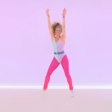 The '80s was a vibrant time for fitness. It's the decade that brought us neon spandex and wild hairstyles along with those famous aerobics videos we all know and love. But those days don't have to be relegated to dusty shelves of VHS tapes. Some legitimately challenging and fun exercises still hold their own after all these years. 80s Aerobics Aesthetic, 80s Exercise, Wild Hairstyles, Aerobics Exercises, 80s Aerobics, Workout Names, Fun Exercises, 80s Workout, Aerobics Workout