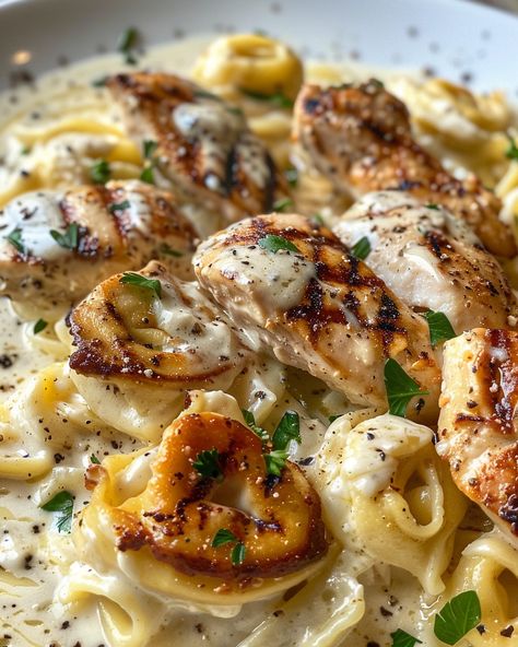 Craving a comforting yet sophisticated meal that's bound to impress? Look no further than this Asiago Tortellini Alfredo with Grilled Chicken recipe. Spicy Chicken Tortellini, Asiago Tortellini With Grilled Chicken, Chicken With Tortellini Recipes, Asiago Tortellini Chicken Alfredo, Chicken And Tortellini Recipes, Chicken Tortellini Recipes, Asiago Tortellini, Chicken Alfredo Tortellini, Asiago Chicken