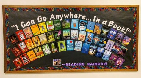 Reading Month Bulletin Board Ideas, Reading Themes Schoolwide, Middle School Monthly Library Themes, Favorite Book Bulletin Board, Library Bulletin Board Ideas, Travel Bulletin Boards, Staff Favorite Books Bulletin Board, Scholastic Book Fair Bulletin Board, Teachers Favorite Books Bulletin Board