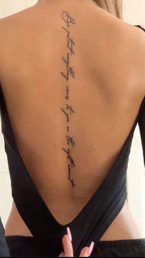 Text Back Tattoo Women, Spine Tattoo Words And Flower, Spine Tattoos Text, Written Back Tattoos, Red Spinal Tattoo Women, Fine Line Full Back Tattoo, Spine Tattoos For Women Strength, Back Tattoo Quotes Spine, Meaningful Back Tattoo Women