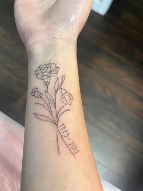 Bouquet Of Flowers Drawn By Family Tattoo, May And March Birth Flower Tattoo, Carnation Memorial Tattoo, Birth Flower Memorial Tattoo, Rose Tattoo With Date, January Birth Flower Tattoo Ideas, Birth Date Tattoos For Women, Flower Memorial Tattoo, January Tattoo Ideas