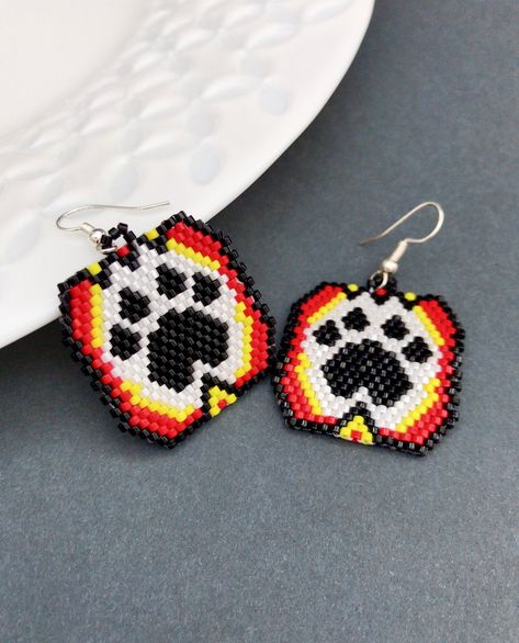 Native Medicine Wheel style earrings with paw design. Beaded earrings in Native style. The earrings are handmade in Native Medicine Wheel style from Japanese Miyuki Delica beads, strong synthetic thread, a clasp of hypoallergenic metal. Length with a clasp - 2 inch Earring width - 1 inch Real colors may slightly differ from the one on the monitor to another, as it depends on specific monitor settings. You can see more of my jewelry in the store: https://www.etsy.com/shop/MagicBeadsStore You can Beaded Earrings Native Beadwork, Paw Print Seed Bead Earrings, Bear Paw Beaded Earrings, Beaded Hoop Earrings Native American, Delica Beaded Earrings, Native Medicine, Beaded Earrings Native Inspire Uplift ⭐, Beaded Medicine Wheel Earrings, Native American Beadwork Earrings