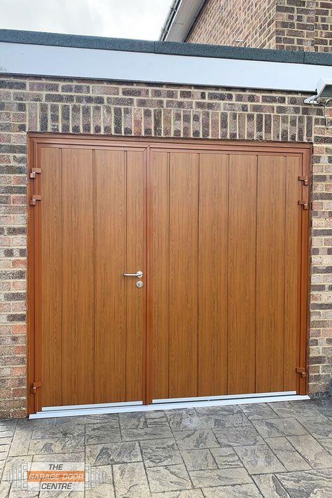 Insulated set of side hinged garage doors with a 1/3 split, super convenient if you just need to enter as a pedestrian, whilst both doors can be opened for vehicle entry! #sidehinged #swingdoors Oak Garage Doors, Hinged Garage Doors, Side Hinged Garage Doors, Garage Door Hinges, Garage Door Openers, Garage Renovation, Garage Door Installation, Golden Oak, Garden Office