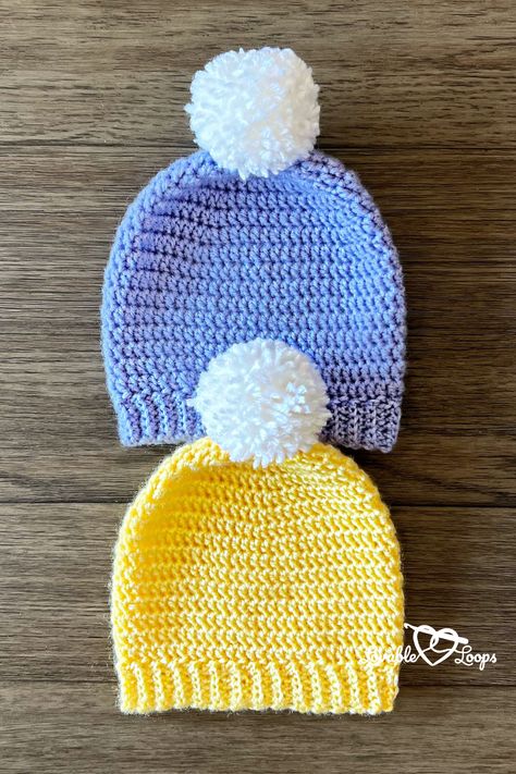 Bundle up the little ones with Lovable Loops' childrens crochet hat pattern. This beginner crochet pattern creates a cozy hat with a ribbed brim and a fun Pom Pom topping. Whether for playdates or chilly days, this free and easy design is a must-have for young fashion. Ready to stitch some joy? Visit our website to grab the full free pattern and let the crafting begin! #CrochetPattern #FreeCrochetPattern #LovableLoops Crochet Hat 12 Months, Crochet Children Hats Free Patterns, 12 Month Crochet Hat, Half Double Crochet Beanie Pattern Free, Crochet Childrens Hats Free Patterns Beanie, Crochet Top Down Hat, Crochet Childs Hat, Easy Crochet Kids Hats, Crochet Hat Free Pattern Kids