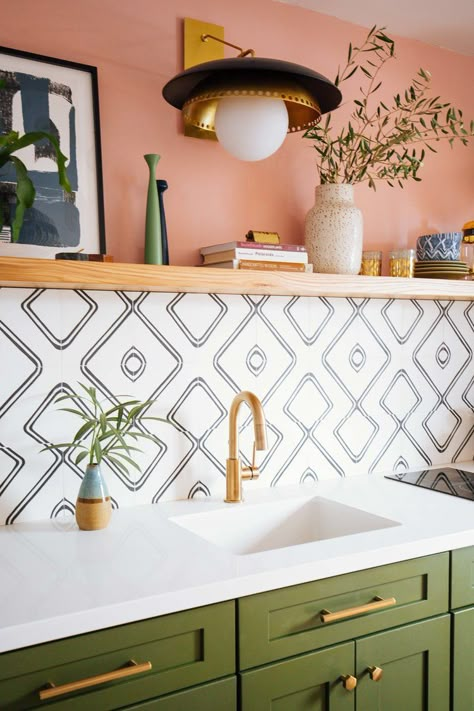 Green Cabinets Orange Backsplash, Constance Moss Kitchen, Colorful California Home, Colorful Backsplash Tile, Funky Boho Living Room, Moroccan Kitchen Ideas, Floating Table Wall, Moroccan Kitchen Backsplash, Morocco Kitchen