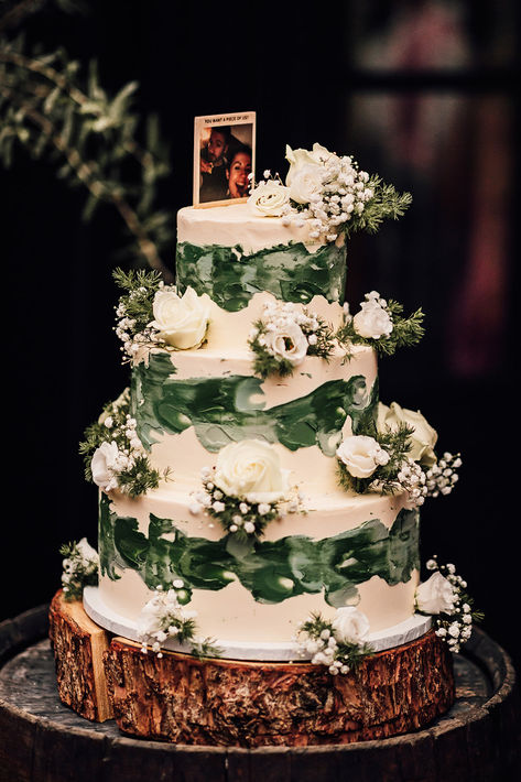 Three tier classic wedding cake with green and white icing decorated with white roses and white gypsophila | rustic wedding cake | wedding cake design | Carrie Lavers Photography Green White Wedding Cake, Polaroid Cake Topper, Green Wedding Themes, White Roses And Gypsophila, Polaroid Cake, Green Wedding Theme Ideas, Wedding Cake With Green, Green Brown Wedding, Wedding Cake Nature