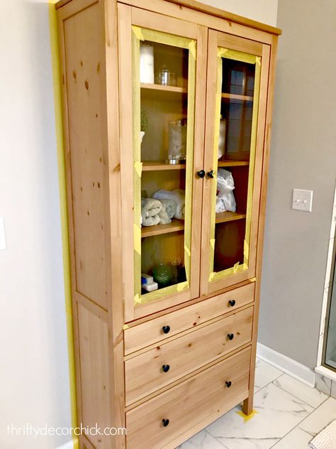 Hemnes Glass Door Cabinet Hack, Tall Cabinet Makeover, Hemnes Glass Door Cabinet, Hemnes Cabinet, Bathroom Cabinets Ikea, Ikea Hemnes Cabinet, Hemnes Bookcase, Ikea Cupboards, Bathroom Cottage