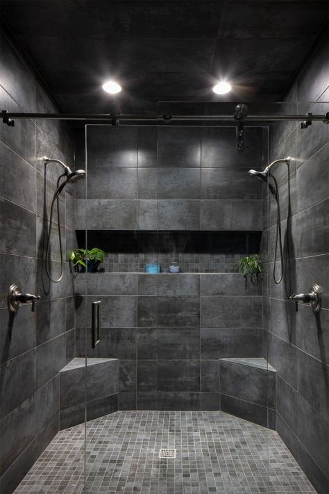 Why Black Shower Floor Tile Is the Hottest Trend in Bathroom Design? | Country Floors of America LLC. Dark Shower Ideas Bathroom, Black Stone Shower Wall, Hexagon Tile Shower Ideas, Dark Tile Walk In Shower, Dark Tile Master Bath, Black Bathroom Shower Ideas, Black Tile Shower Wall, Black Bathroom Shower Tile, Black Tiled Shower Ideas