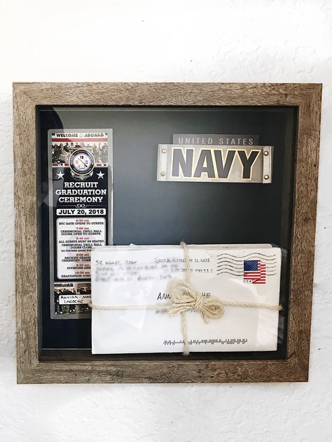 Boot Camp/ Basic Training Shadow Box Display #navy #militarygirlfriend #diy #diyhomedecor #navygirlfriend #basictraining #bootcamp Boot Camp Graduation Signs, Navy Bootcamp Party, Navy Farewell Party Boot Camp, Navy Care Package, Us Navy Party, Boot Camp Graduation Gifts, Us Navy Shadow Box Ideas, Navy Boot Camp Graduation, Military Housing Decorating