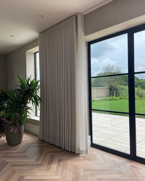 WOW just wow 😮 This home is just so beautiful. A lovely project we’ve been working on for a while now with the lovely interior designer Rachael @featherandpaint Our client wanted to show as much glass as possible on these windows as the views are amazing. We were able to extend the wave tracks along the walls so the curtains don’t obstruct the view during the daytime. It’s going to be even more stunning when the new dining table is in situ ❤️ #view #rural #kitchen #diningroom #openplanliv... Wave Track Curtains, Tv Stand Decor Living Room, Tv Stand Decor, Wave Curtains, Wardrobe Door Designs, Door Design Interior, Window Dressings, Wardrobe Doors, Bifold Doors