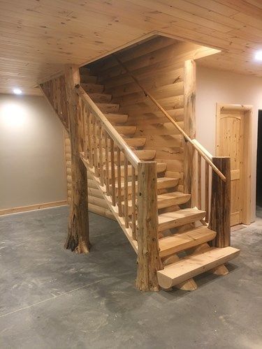 7 Rustic Railing Ideas | Northern Log Log Stair Railing Ideas, Log Railings For Stairs, Interior Design Log Cabin, Log Stairs Staircases, Log Home Staircase Ideas, Log Cabin Stairs, Wood Staircase Design, Rustic Railing, Log Stairs