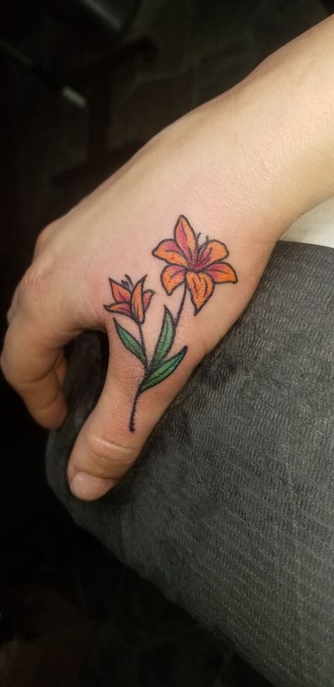 Lily Tattoo American Traditional, Orange Day Lily Tattoo, American Traditional Lily Tattoo, Lily Traditional Tattoo, Tiger Lily Tattoo Small, Orange Lily Tattoo, Traditional Lily Tattoo, Day Lily Tattoo, Easter Lily Tattoo